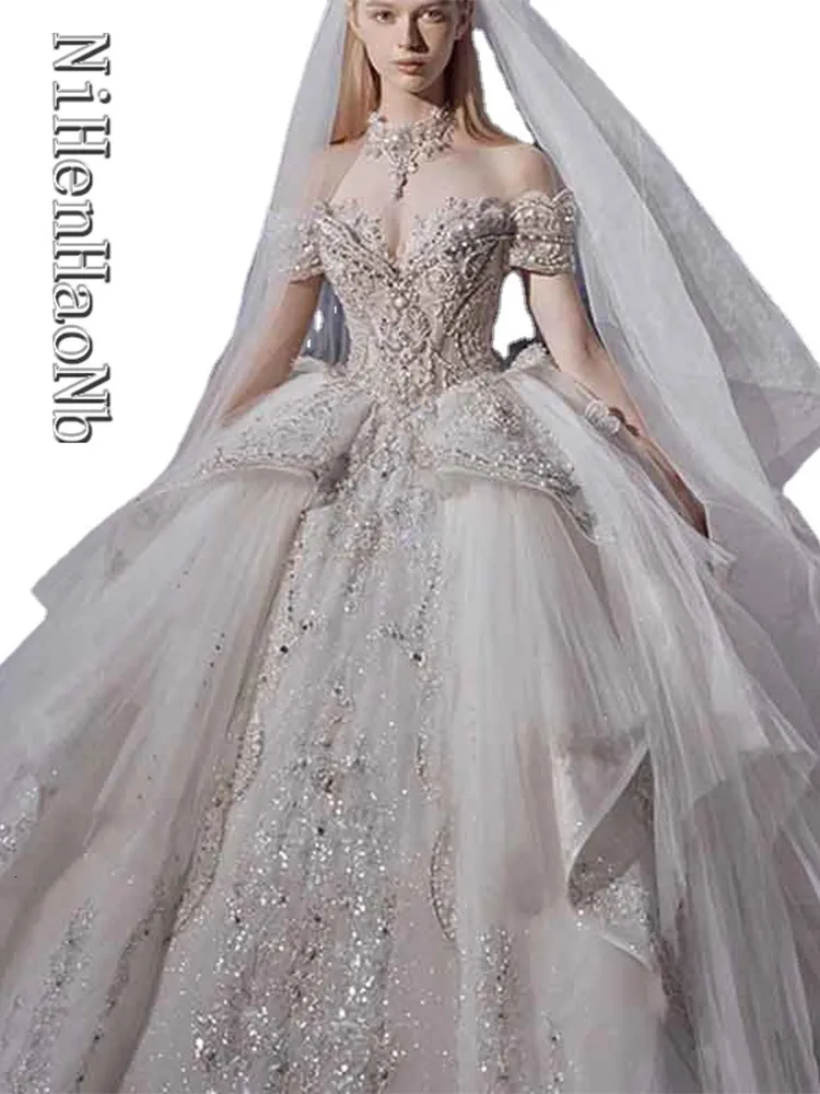 Stedelijke sexy jurken Luxe trouwjurk Off-shoulder Prinses Sparkly Applicaties Hofsleep Bruidsjurken 230825