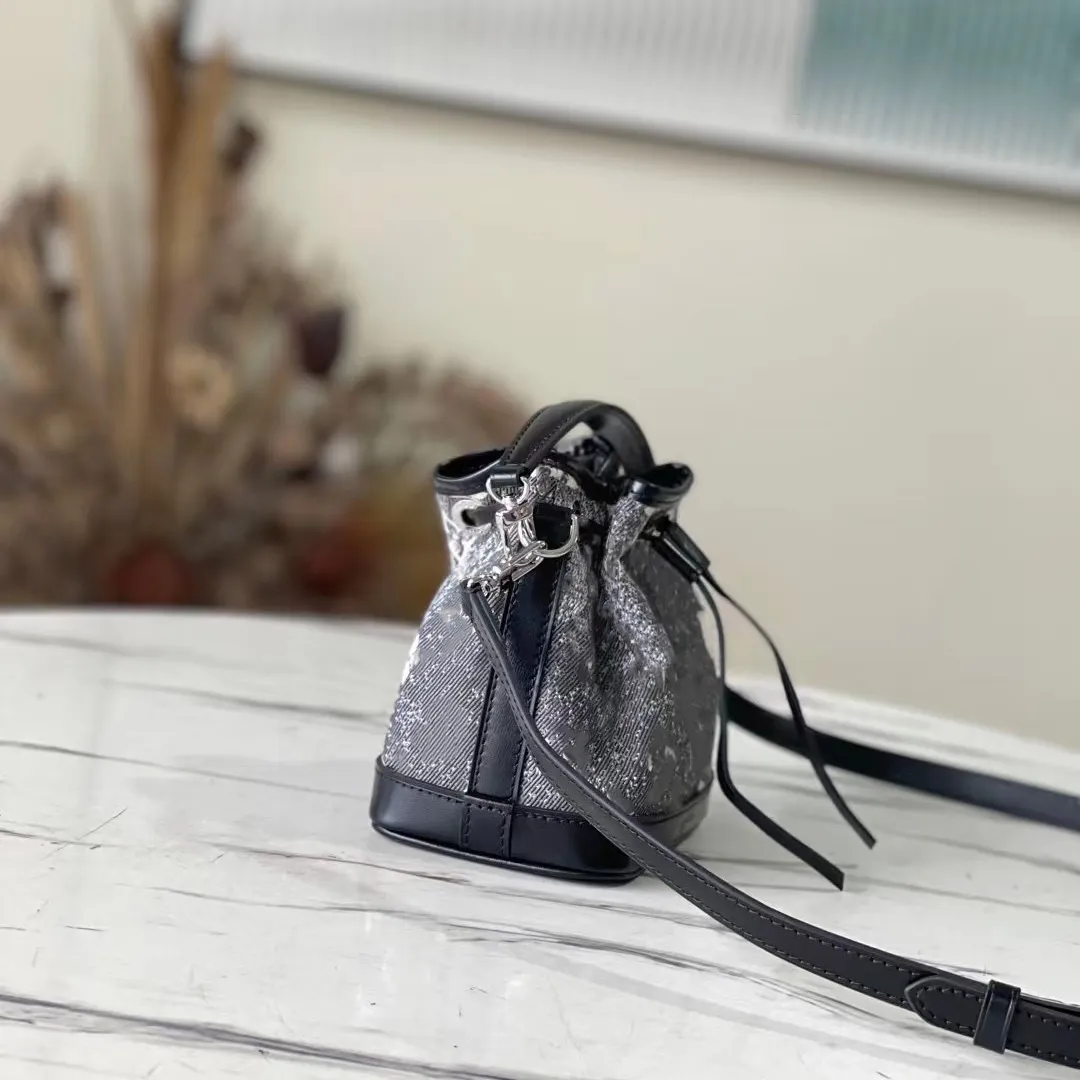 Designer mini bucket bag best sale