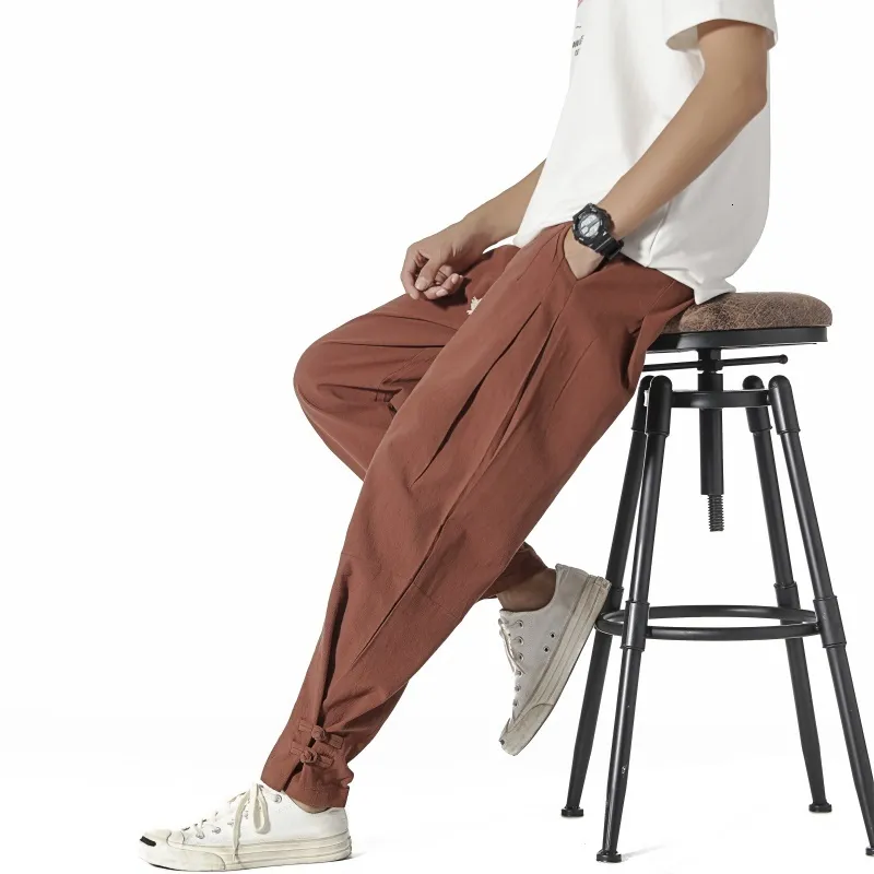 Pantaloni da uomo Arrivo Stile giapponese Baggy Bloomers Pantaloni in cotone e lino Harem da uomo Pantaloni solidi con fascia alla caviglia Uomo M66 230824