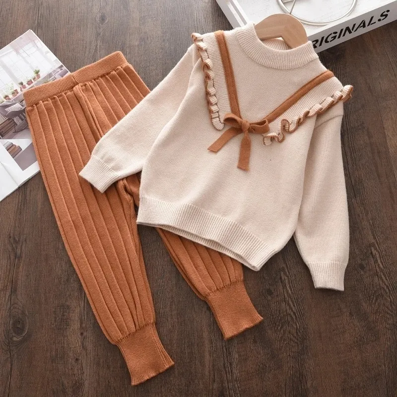 Set di abbigliamento Melario Autunno Inverno Moda Bambina Fiocco lavorato a maglia Abiti spessi Bambini Caldo maglione a maniche lunghe Pantaloni 2 pezzi Set Baby Girl Outfit 230825