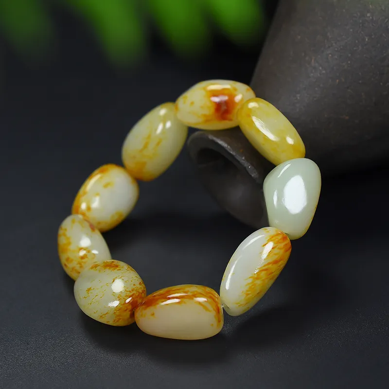 Xinjiang Hetian Jade Samenherstellung Rohstein Armband Anhänger lose Perle rot eins weiß rot Schlamm Handserie von Männern und Frauen