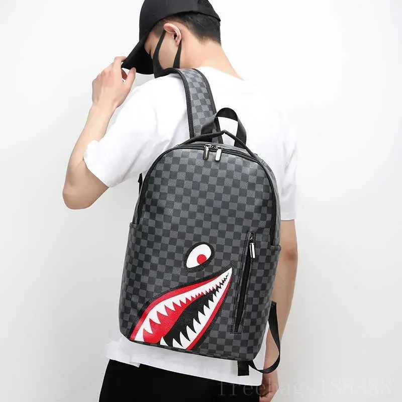 2023 Designer mochila estilo marca de moda grande capacidade mochila masculina nova tendência da moda mochila de couro estudante mochila mochila saco de férias