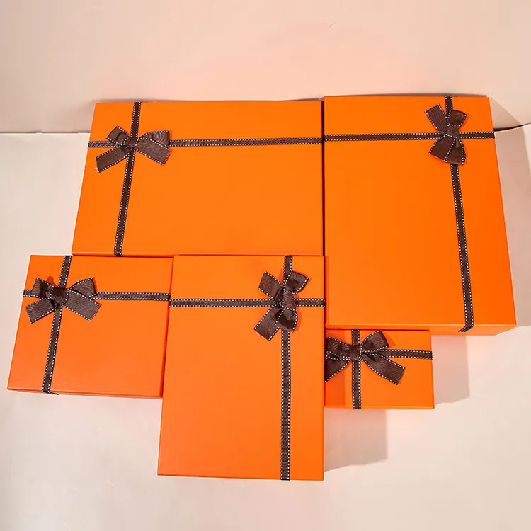 La dernière boîte à bijoux multifonctionnelle à nœud papillon orange, de nombreux styles parmi lesquels choisir, prend en charge toute personnalisation de logo