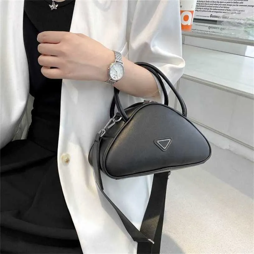 13% OFF Bag 2024 New Launch Designer HandbagNew internet celebrity Women's soft leather bowling Embossed wide shoulder strap Triangle portable diagonal cross