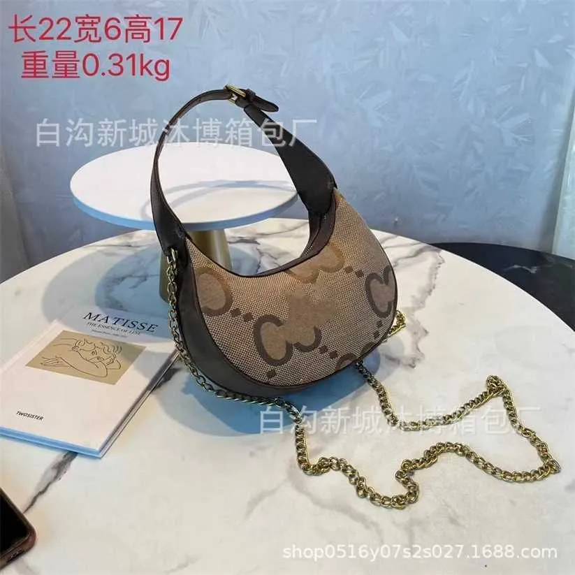 12% de réduction Sac 2024 Nouveau lancement Designer Sac à main Lancement anticipé Niujiao Bao Underarm Nouveau imprimé une épaule bandoulière mode chaîne Dumpling