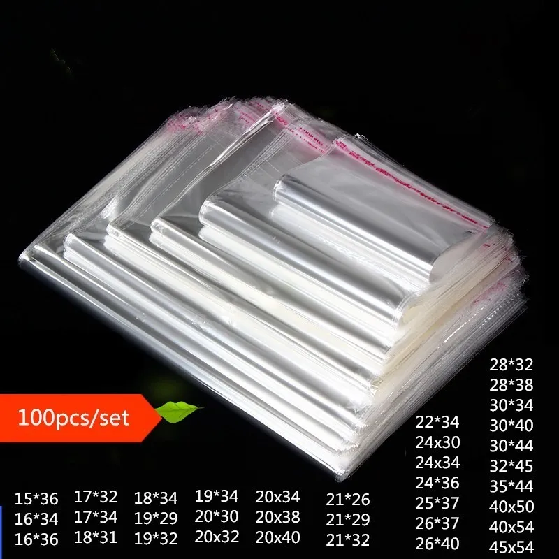 Present Wrap 100 Piece Clear Garment Self Adhesive Pags Wedding Party Opp Present Bag T Shirt and Clothes Magazine Books Packaging Plastic Bag 230828