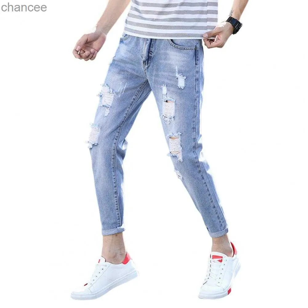 Koreansk stil mitten av ris-dragkedja flugfickor män smala passande mager jeans rippade hål smala fit denim pants streetwear hkd230829