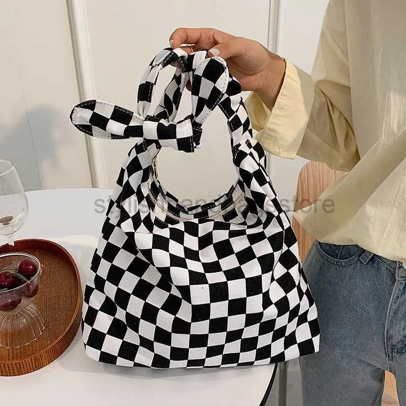 TOTES PLAIDデザインキャンバスショッピングバッグショルダーボディ女性バッグ2021新しいレジャーショッピングハンドバッグボウタイ女性のハンドバッグスタイリッシュハンドバッグストア