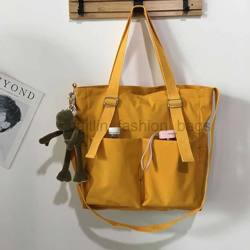 Borse a tracolla Borsa a tracolla in tela di grande capacità Borsa da studente impermeabile Oxford Borsa a secchiello Borsa a mano casual Borsa a tracolla da donna caitlin_fashion_bags