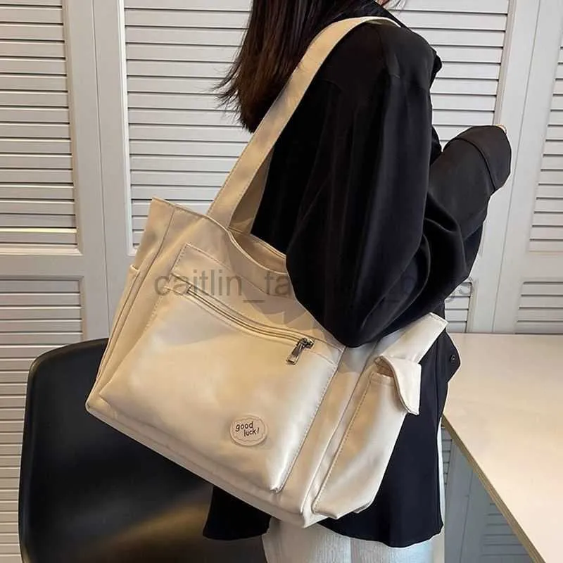 Sagni di grandi dimensioni Bag di tela femminile 2022 Nuovo semplice e pratico college per studente Student Spall Group Borse Group Caitlin_Fashion_Bags