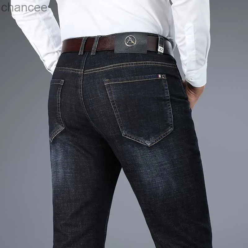 Klasyczne męskie antykradzieżowe dżinsy z guziki jesień jesień zima nowe biznes luźne dżinsowe spodnie męskie marka swobodne spodnie HKD230829
