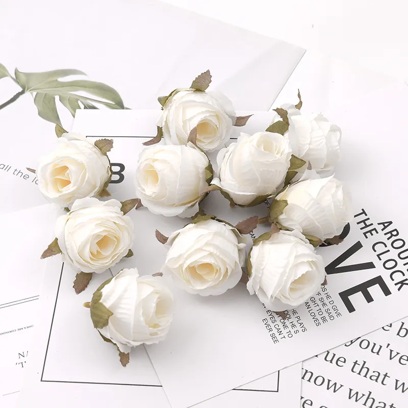 Guirnaldas de flores decorativas 50 piezas 4 cm capullo de rosa blanca cabezas de flores de seda artificiales decoración de boda DIY guirnalda Scrapbooking artesanía flores falsas 230828