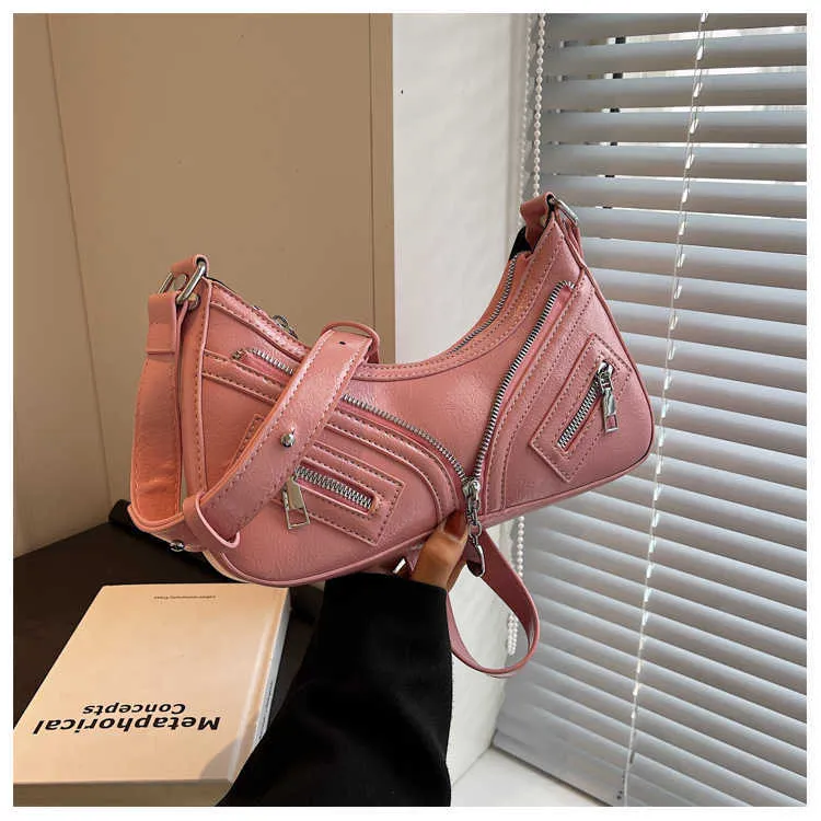 Venda quente motocicleta estilo picante menina saco feminino 2024 novo francês um ombro axilas fluxo de maré crossbody