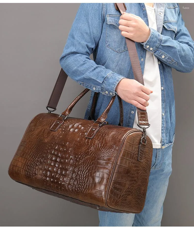 Duffel sacos moda couro homens saco de viagem real fim de semana genuíno bagagem de mão casual durante a noite duffle para