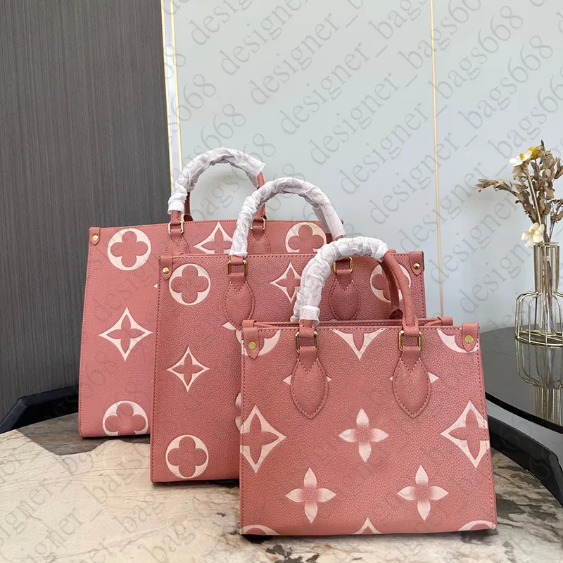 Lyxiga shoppingväskor designer kvinnor väskor äkta läder tote handväskor präglade koppling handväskor stora kapacitet axelpåsar rosa mamma väskor crossbody onthego väska