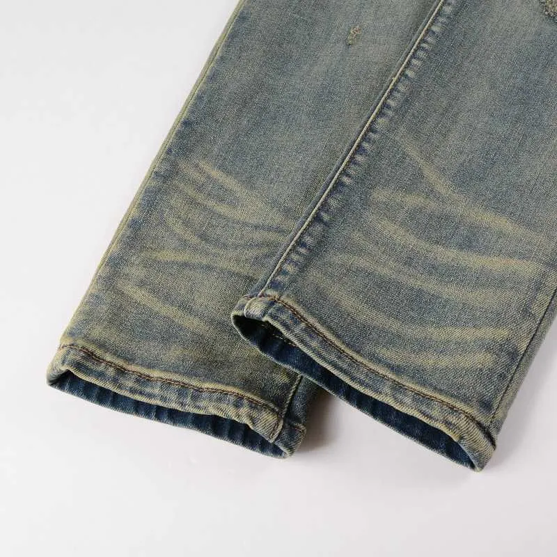 Mens Light Blue Drip Denim Patched Jeans With Distressed Mens Light Blue Drip Denim Patched Jeans With Distressed