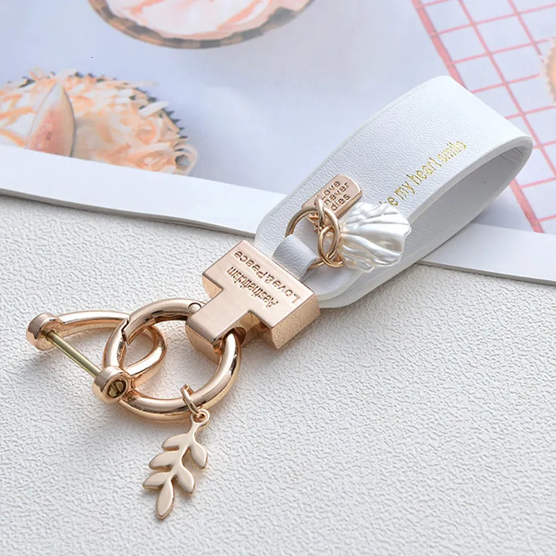 Keychains Lanyards: Fashion Leaf Shell Pendant Keychain with PU Leather ...