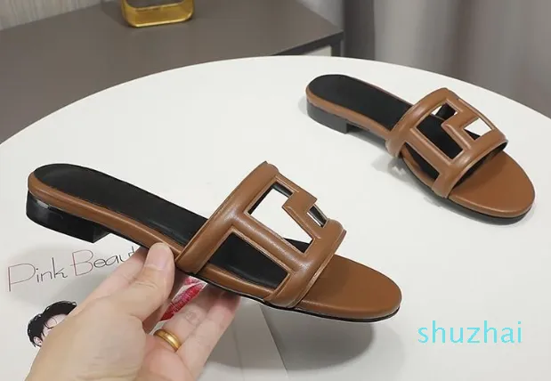 Designer platte schoenen Luxe slipper dames Geborduurde sandalen Mode Slippers Alfabet Slipper dames Zomer strandglijbaan Lage hakken voor dames