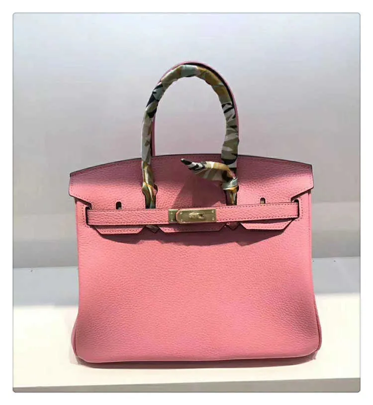 BK äkta handväska 2024 Cherry Blossom Powder Bag Fashion First Layer Cowhide Läder Kvinnans låsande handväska Tote axelväskor