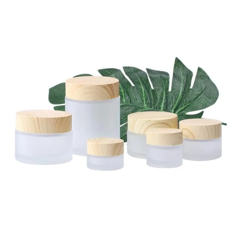 Partihandel Frosted Glass Jar Cream Flaskor Runt kosmetiska burkar Hand Ansiktsflaska med träkakor 5G-10G-15G-30G-50G-100G Drop Leverans