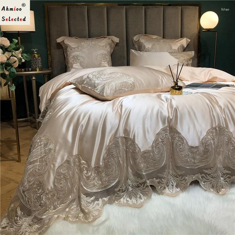 Conjuntos de cama de alta qualidade cor sólida elegante oco out lace consolador capa de algodão conjunto de edredão macio cama de seda 4 pcs