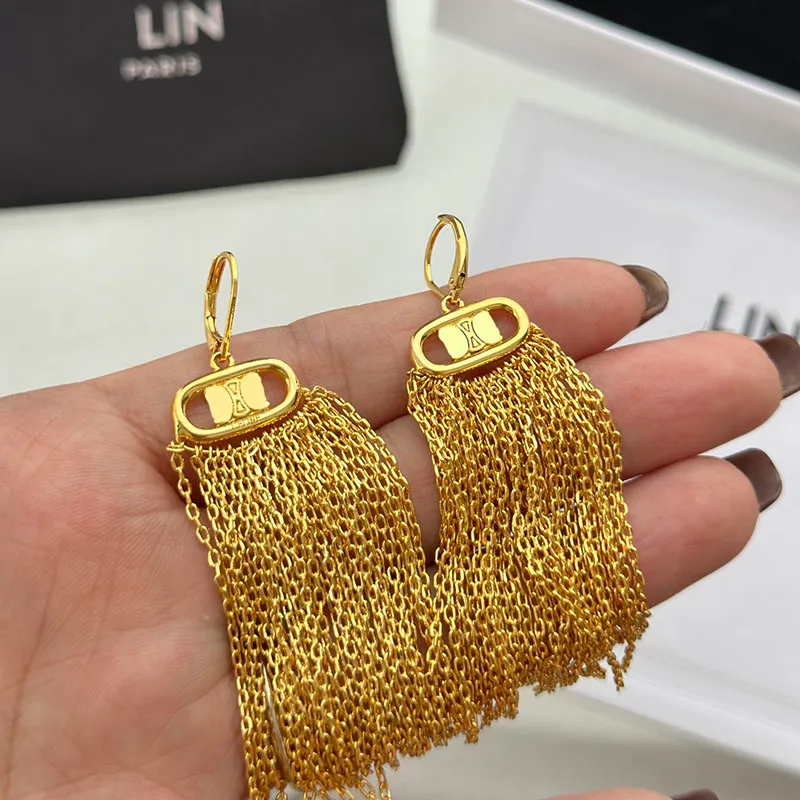 Diseñador Borla Cuelga Pendientes Oro Mujeres Cuelga Moda Joyería