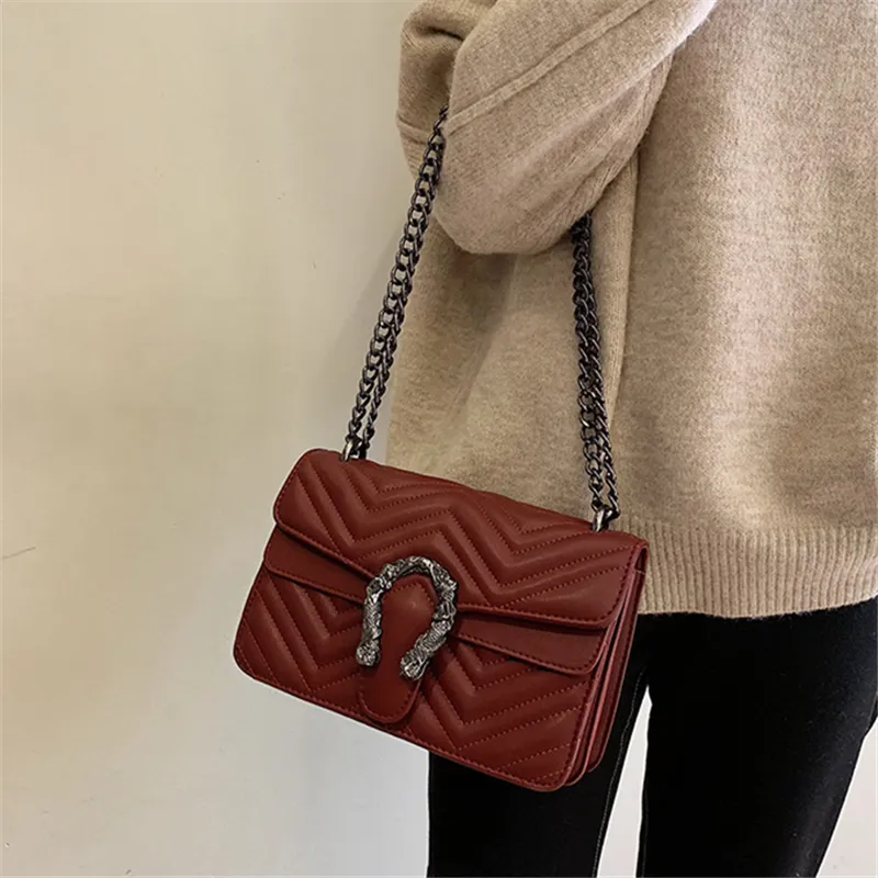 Bolso de mensajero de mujer con patrón de onda de marca al por mayor de fábrica bolsos de cadena de diamantes clásicos bolso de hombro de cuero con diamantes de ambiente elegante