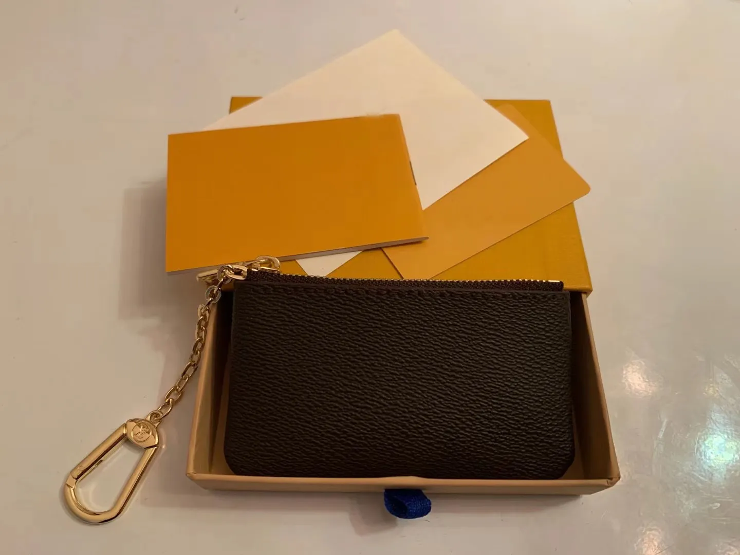 KEY POUCH Designers Miniplånbok Mode Dam Nyckelring för män Kreditkortshållare Myntväska Lyx M62650 med lådplånbok Plånbok
