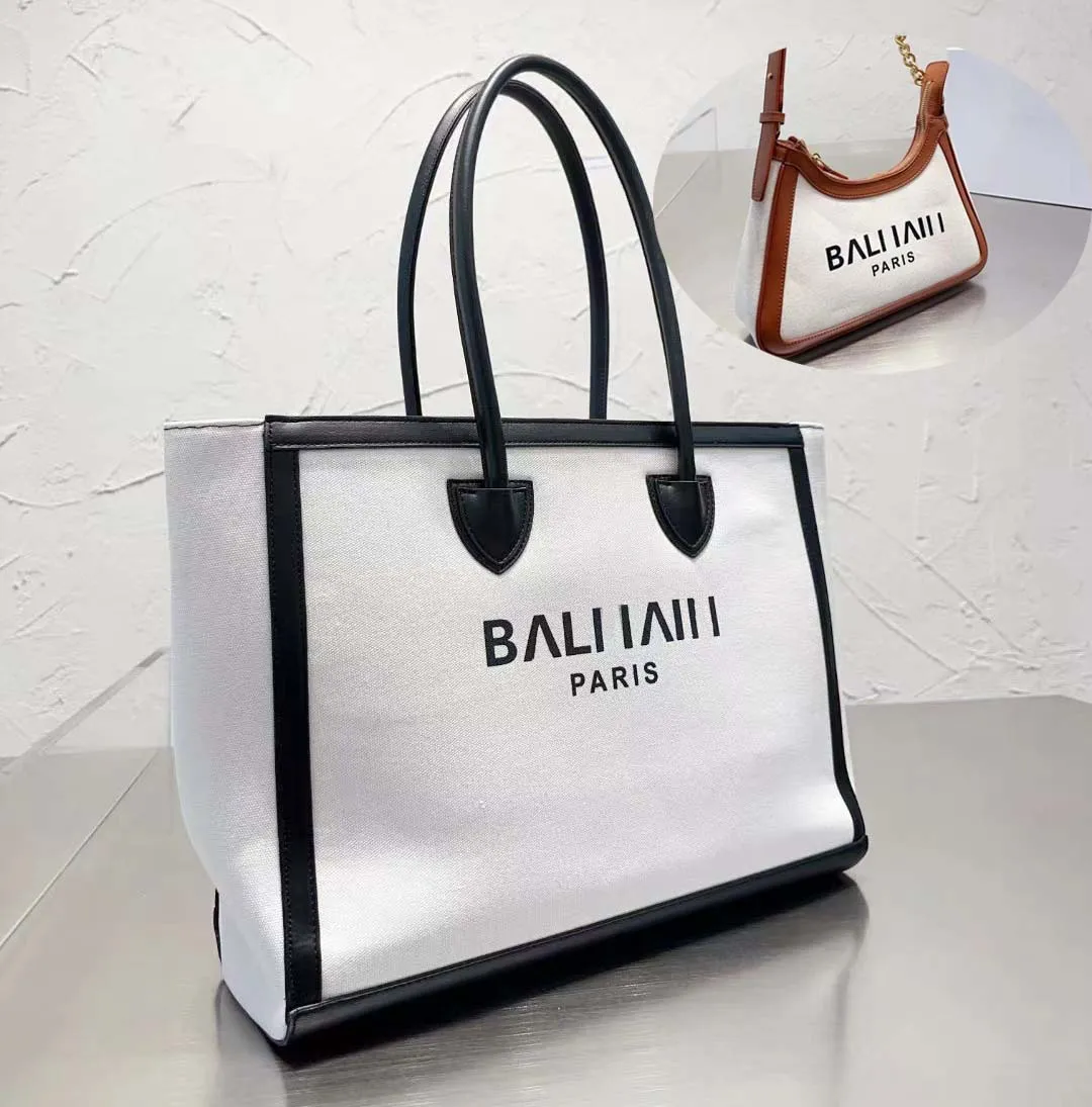 2023 bolsos de diseñador de lujo para mujer Totes de lona de cuero Venta caliente bolsa de letras negras debería ser líder diseñador de bolsos que vende cadena de cuerpo de dama monedero Tote