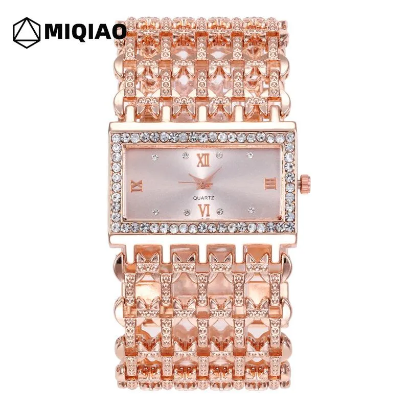 Relojes de pulsera Venta de relojes de mujer Aleación de moda Pulseras de cuarzo analógicas Regalo de Navidad para niñas W456