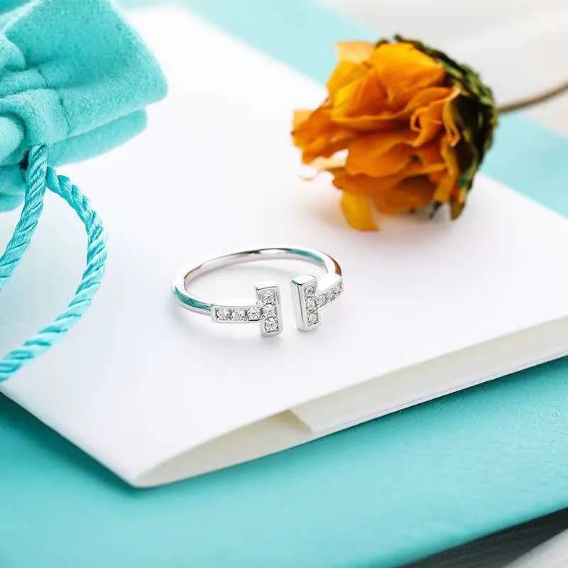 Designer Ring Ring Platinum Double T Couple de diamant Arrangement d'ouverture du mariage ne s'est pas s'estompé