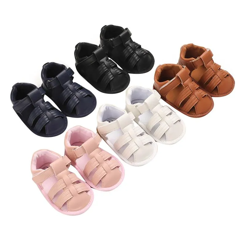 Första vandrare 2023 mode sommarfödd spädbarn baby pojkar flickor pu-lether skor mjuk ensam ihåliga sneakers sandaler passar för 0-18m