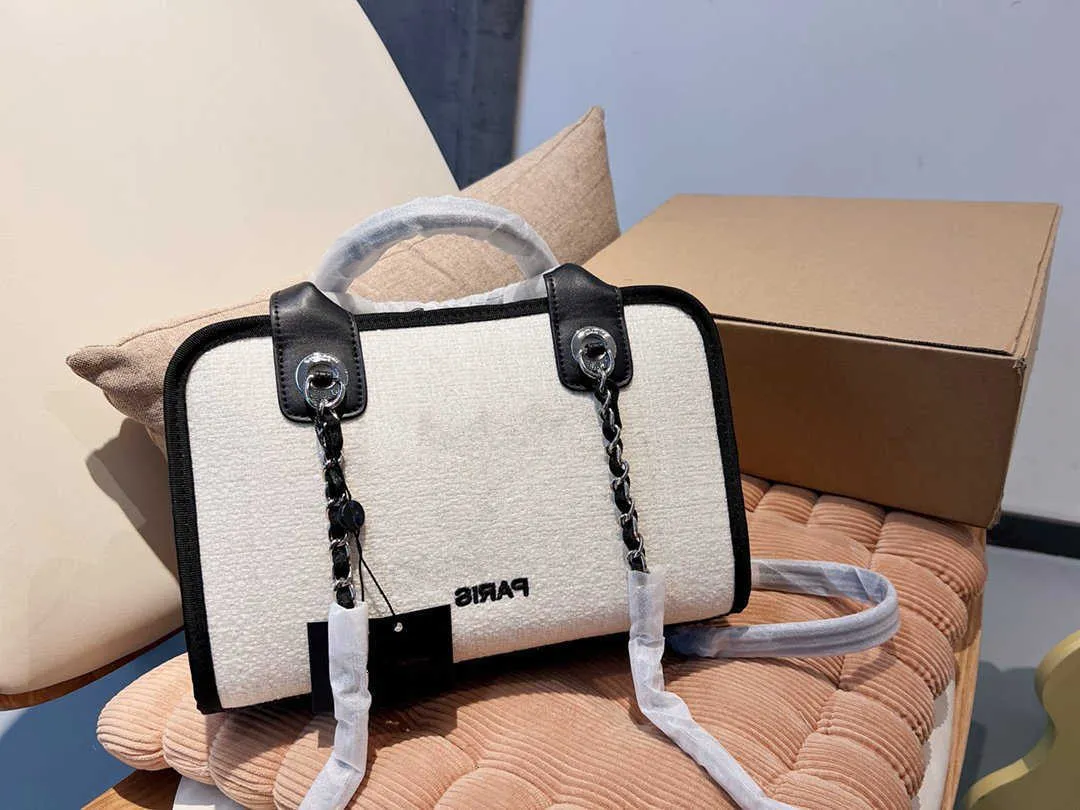 23S مصمم حقائب Luxurys Pearl Retro Designers أكياس حقائب اليد النسائية كبيرة حقيبة كاميرا السيدات الجلود غير الرسمية كتف أنثى أزياء الشبكة الماس