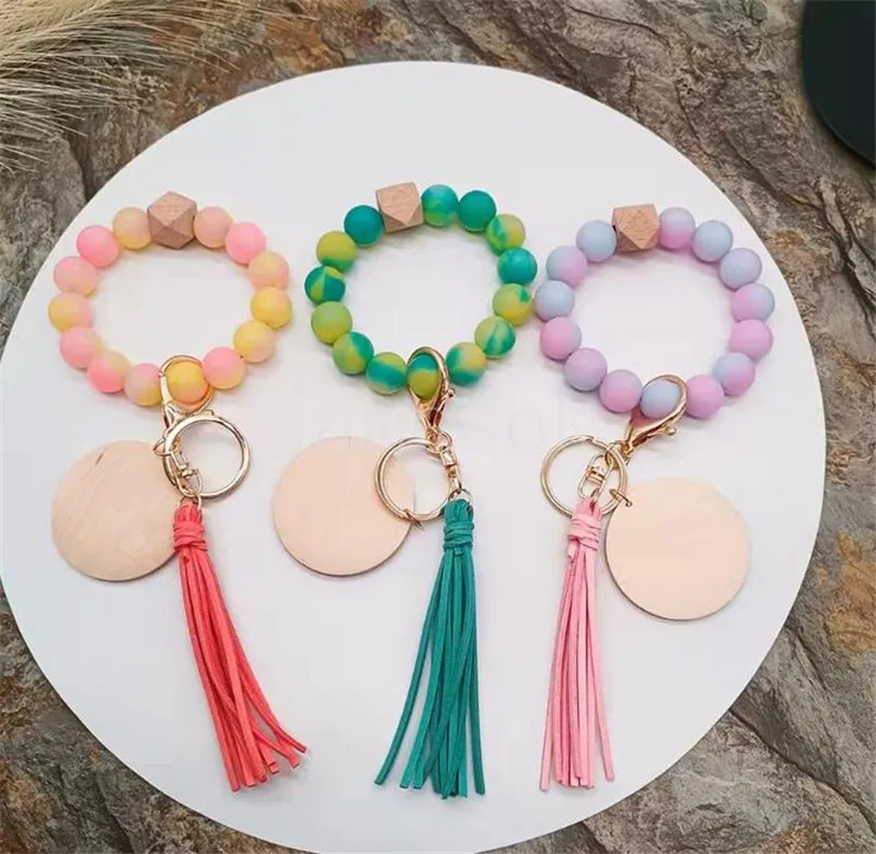 Pulsera de hilo con cuentas y borlas, llavero de cuentas de silicona de calidad alimentaria, llavero para mujer y niña, correa para muñeca DF068