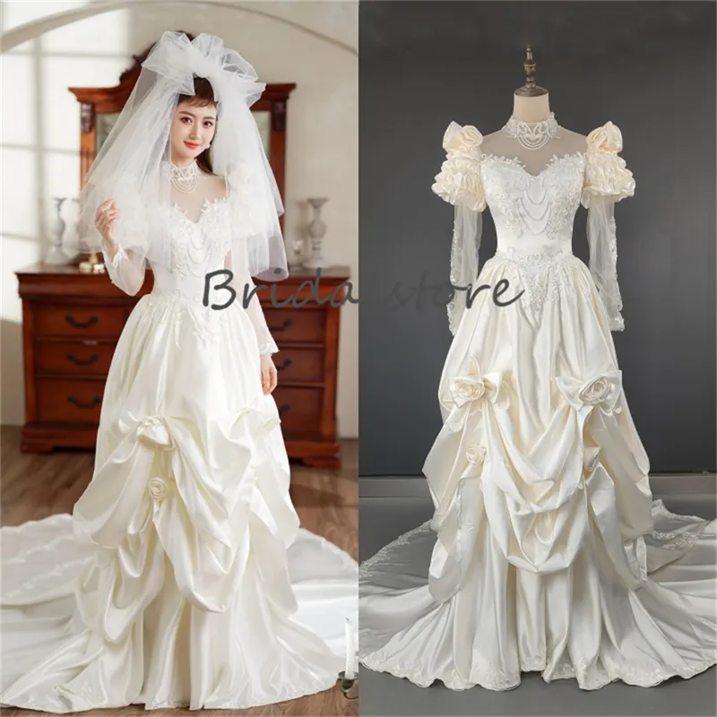 Renaissance crème trouwjurk 2023 Lange mouw Princess Castle Medieval Goth trouwjurken Bloemen High Neck Victoriaanse Gothic Western 1950s Bridal Jurys vrouwen