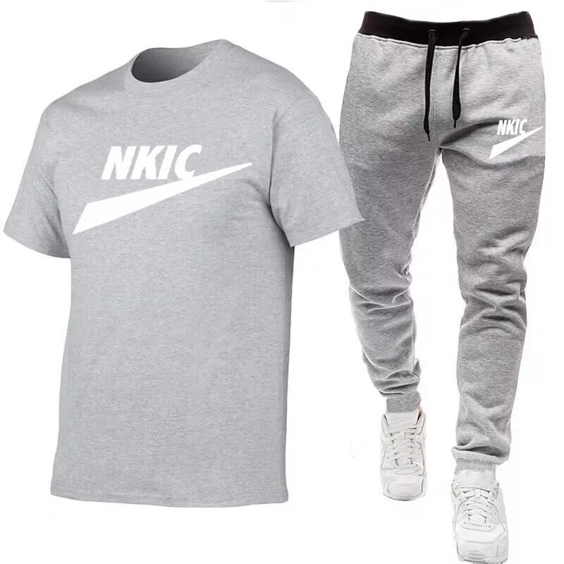 New Summer Clothes Fashion Man Tracksuits Brand LOGO Print Solid