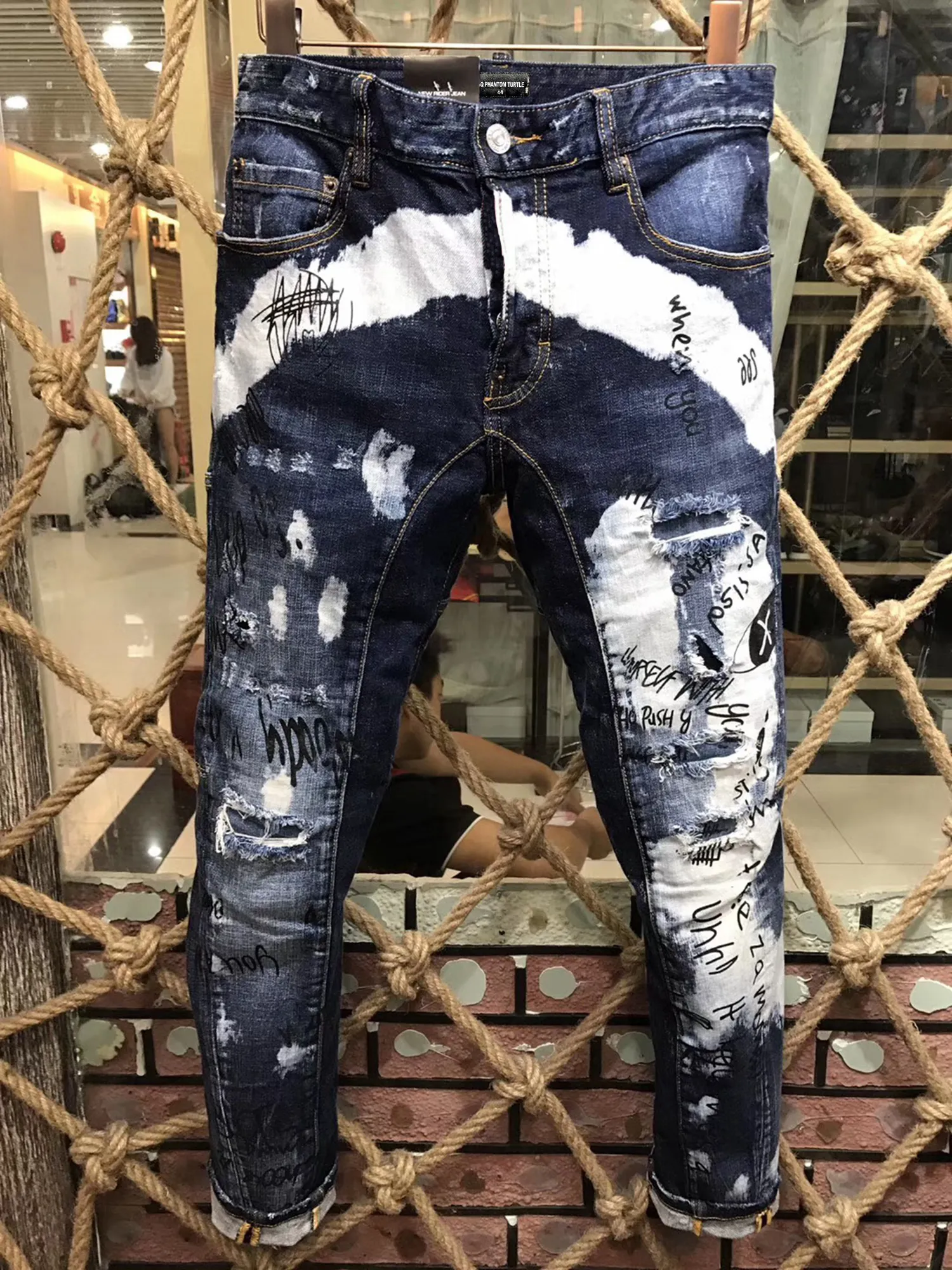 DSQ PHANTOM TURTLE Jeans da uomo Jeans firmati di lusso da uomo Skinny strappati Cool Guy Foro causale Denim Fashion Brand Fit Jeans Pantaloni lavati da uomo 6920