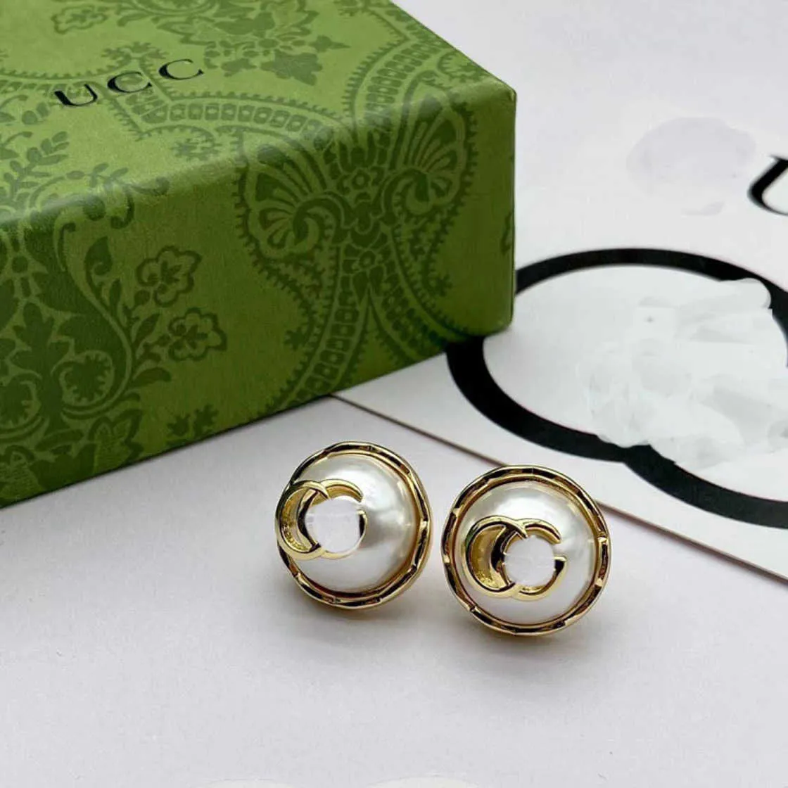 70% de réduction 2023 nouveau luxe de haute qualité bijoux de mode pour Double demi-pièce perle en laiton argent aiguille polyvalent boucles d'oreilles femme