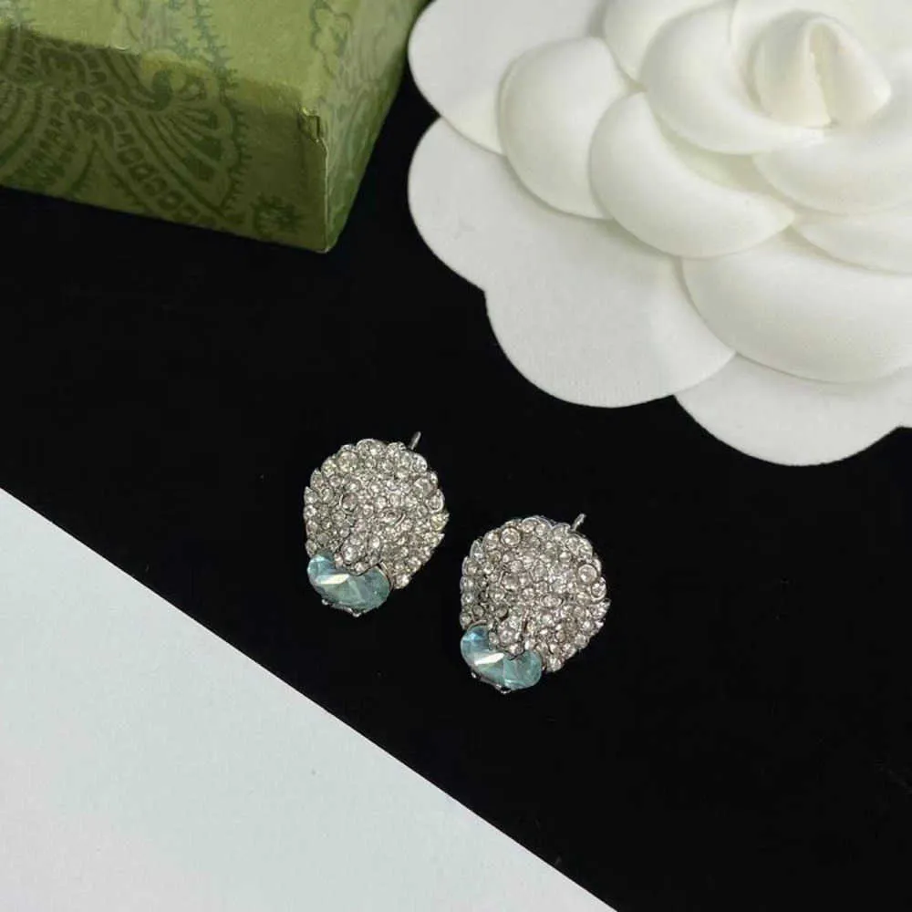 20% de réduction 2023 Nouveaux bijoux de mode de haute qualité de luxe pour 2023 Lion Hum Head Strass avec boucles d'oreilles en laiton en pierre en forme d'œuf bleu mer