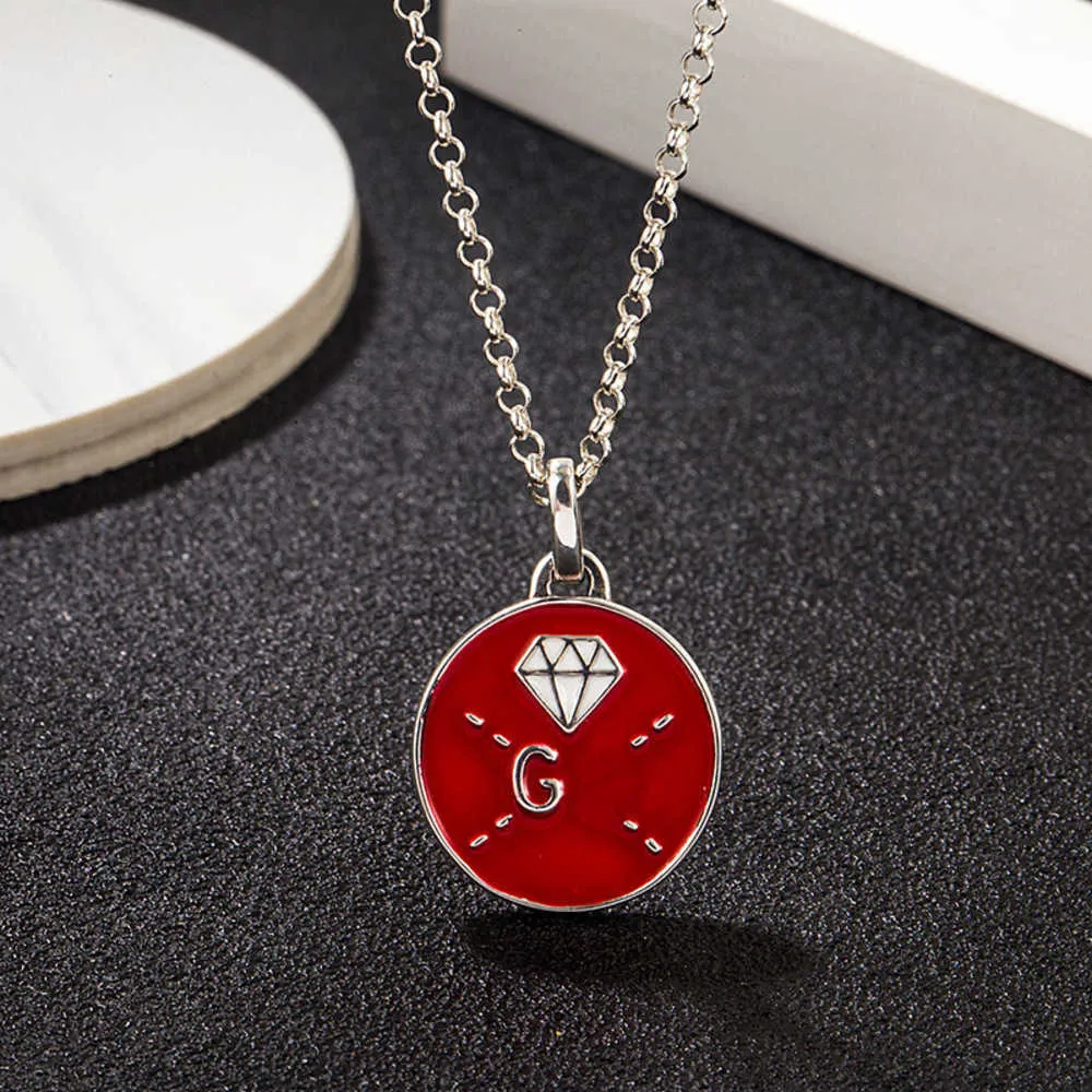 20% de descuento 2023 Nueva joyería de moda de lujo de alta calidad para plata esterlina Collar de doble patrón Pegamento de esmalte rojo Cadena de suéter de tendencia caída