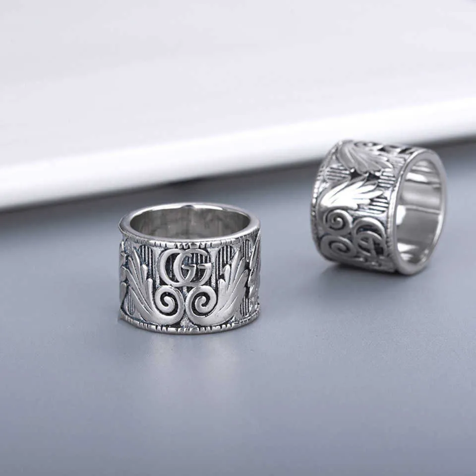 95% rabatt 2023 Nya lyxiga högkvalitativa modesmycken för dubbel thailändskt silver tredimensionell snidad ängelvinge fjädermönster mäns och kvinnors samma par ring