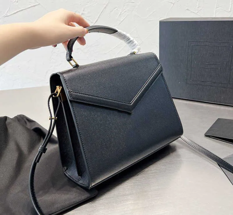 Cassandra top handle medium bag in grain de poudre embossed leather sale