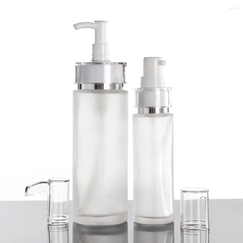 Bottiglie di stoccaggio Fornitori cinesi Lozione per la cura della pelle vuota da 100 ml / contenitore per toner Bottiglia di vetro per lozione con pompa lunga