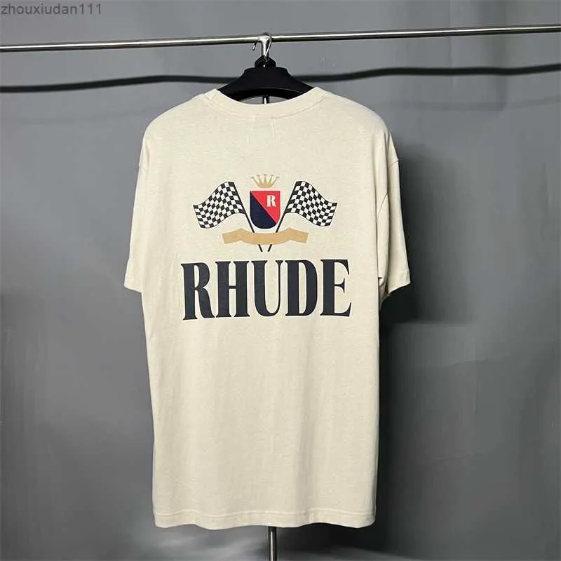 2023 Rhude t Shir Diseñador para hombre Shir Classic F1beach Cozy Paern Prined Shir con cuello redondo y mangas cortas para hombres y mujeres