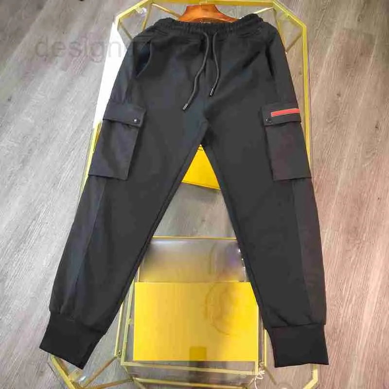 Pantalons pour hommes Designer mens designer pants automne hiver peluche triangle lettre Italie pantalon poche coton hommes femmes casual noir gris UA80