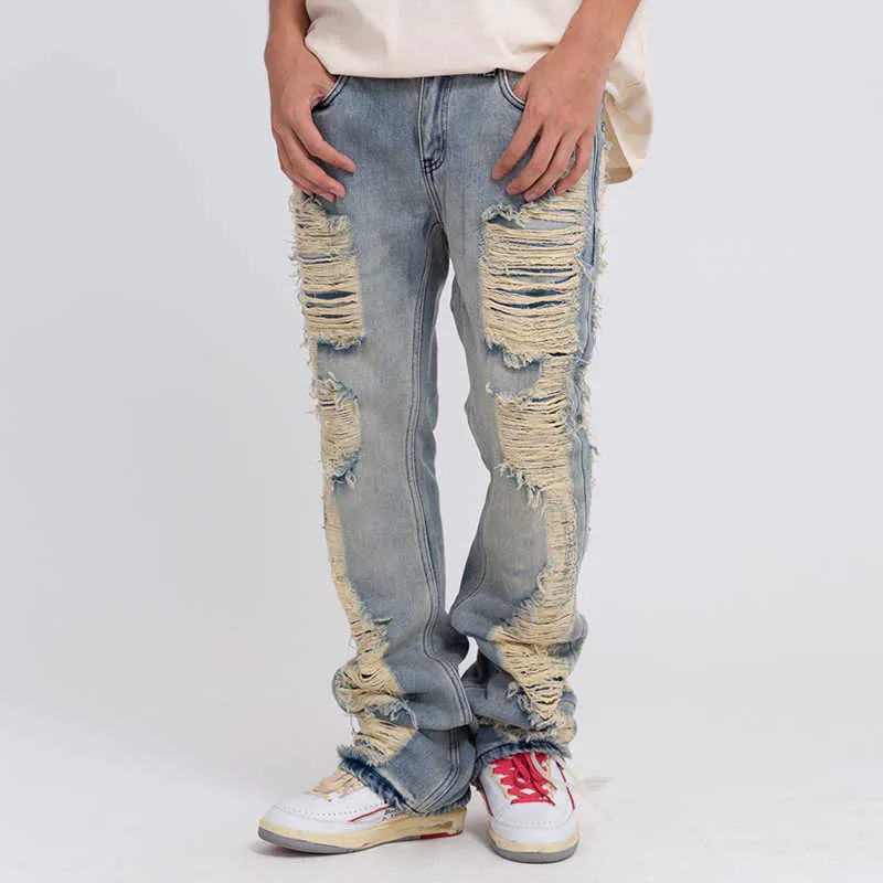 Jeans pour hommes Harajuku Ripped Frayed Hole Blue Washed Jeans Pantalons pour hommes et femmes Poches Streetwear Casual Baggy Denim Pantalon Z0301