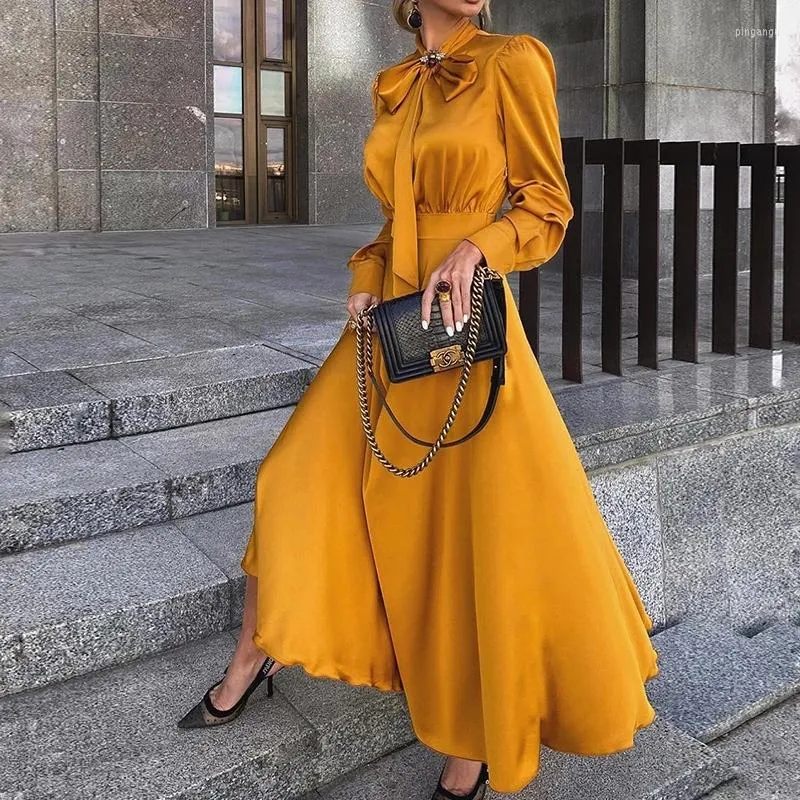 Casual jurken Elegante vintage stijlvolle outfits vrouwen 2023 Fashion lente herfst herfst lange mouw satijn geel jurken chic maxi