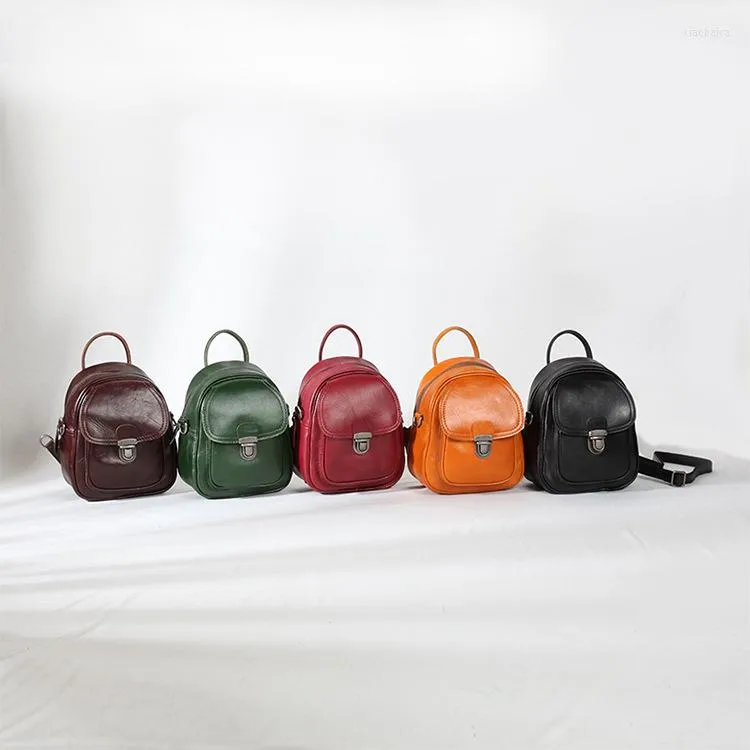 Mochilas escolares Retro ocio moda cabeza capa piel de vaca edición Han lujo mujeres Simple Casual Color sólido bolsa de viaje mochilas clásicas