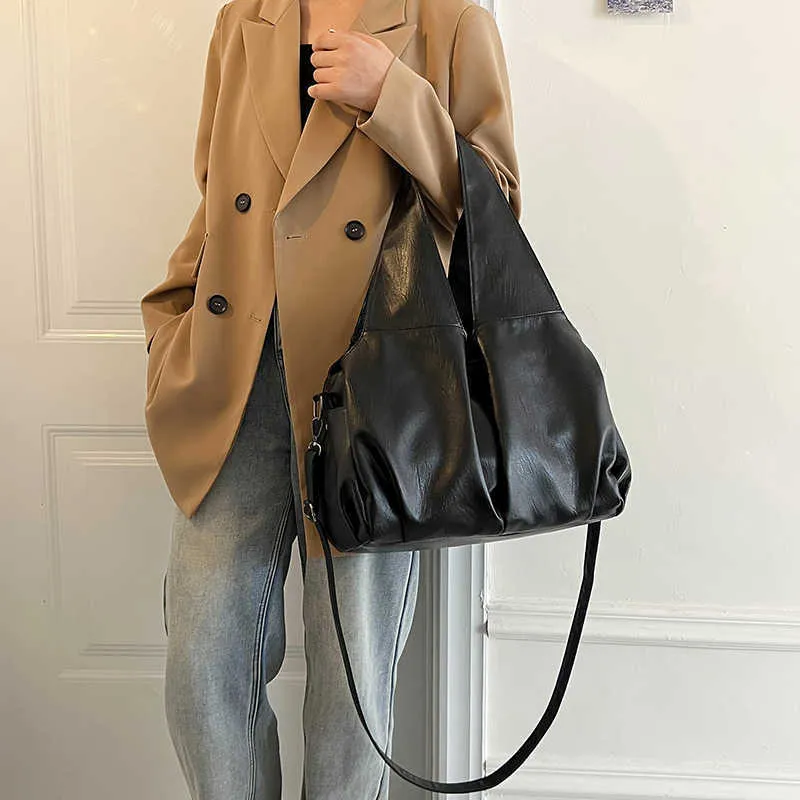 NXY Retro Solid Color Hobo Bags for Women 2023 Spring Trend Designer Fashion Simple Leather Axla Side Bag Lady Handväskor