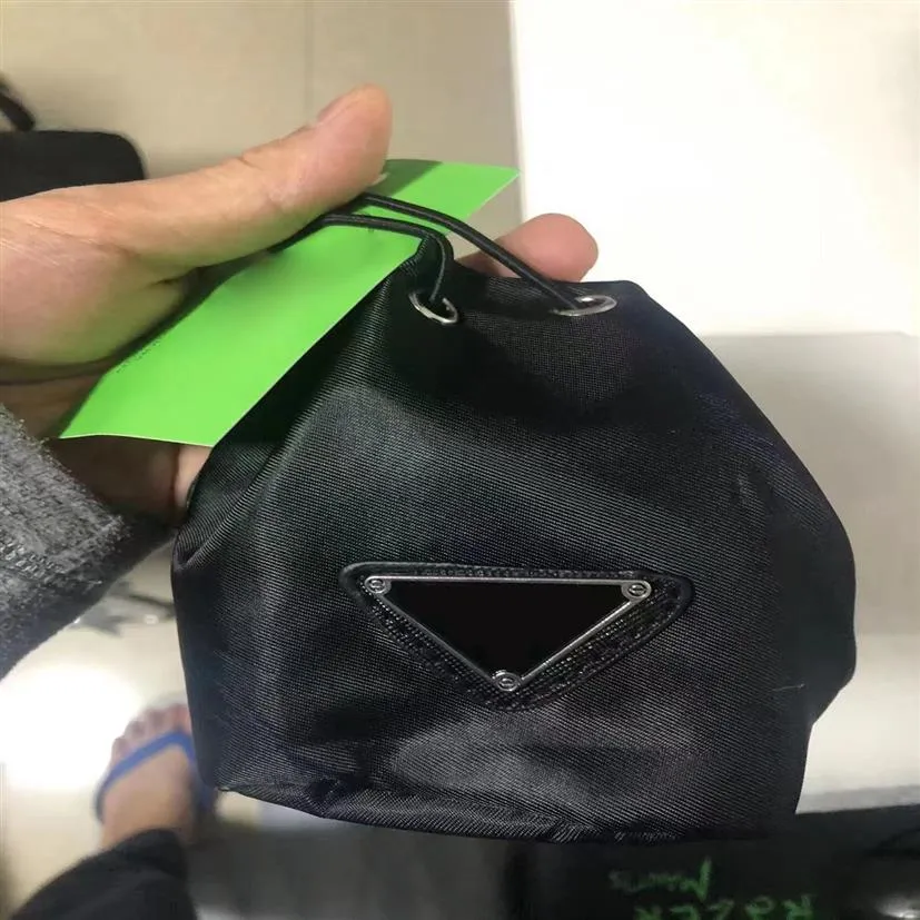 Porte-clés de luxe Mini sac designer joli portefeuille de changement fait à la main en cuir porte-clés mode hommes et femmes sac à main penda2595